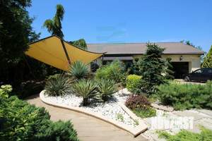 Дом 370м², 3-этажный, участок 8 сот.