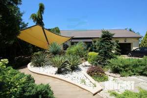 Дом 370м², 3-этажный, участок 8 сот.