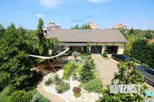 Дом 370м², 3-этажный, участок 8 сот.