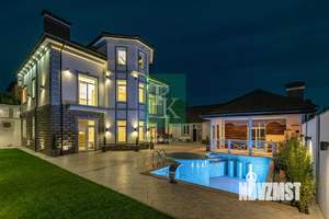 Коттедж 425м², 3-этажный, участок 8 сот.  